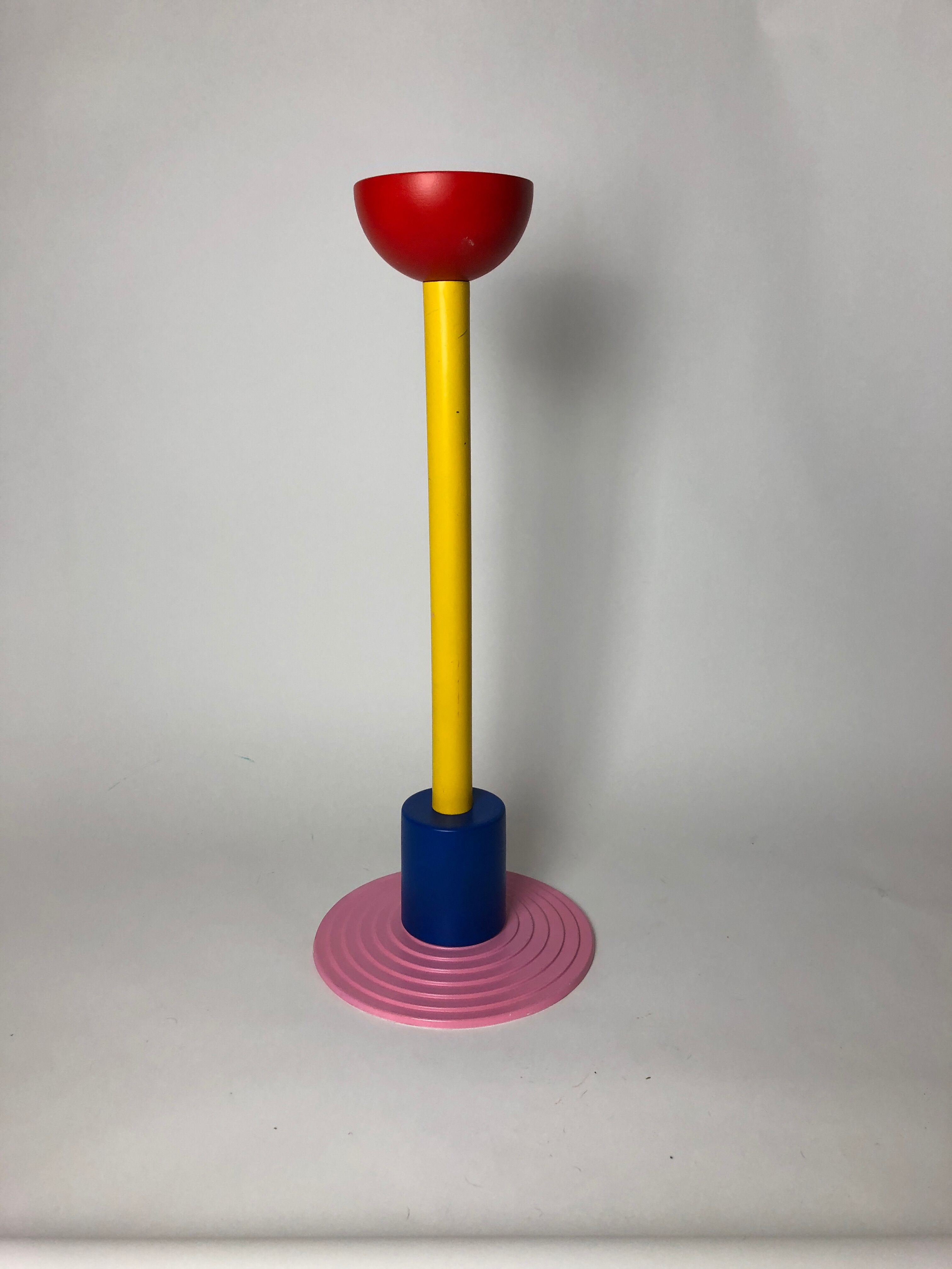 Column wears memphis plant of 80s italian metal design