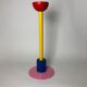 Column wears memphis plant of 80s italian metal design