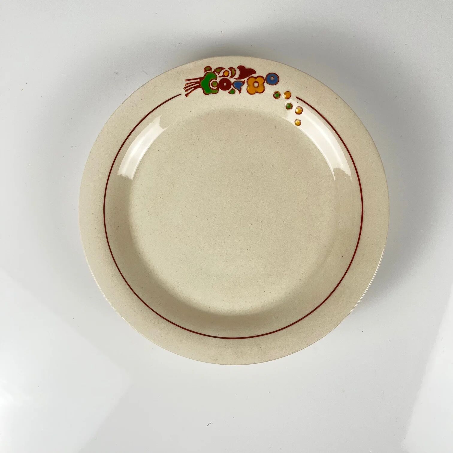 Presentation plate with pedestal Longwy, early 20th century, floral decoration.