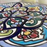 Polychrome decorative ceramic plate