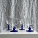 Set of 2 small king-shaped stemmed glasses and 2 small ball-shaped stemmed glasses
