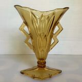 Old yellow glass vase triangular handles diamond base