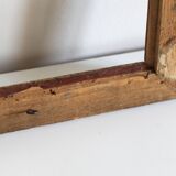Cadre ancien à moulures noires et dorées