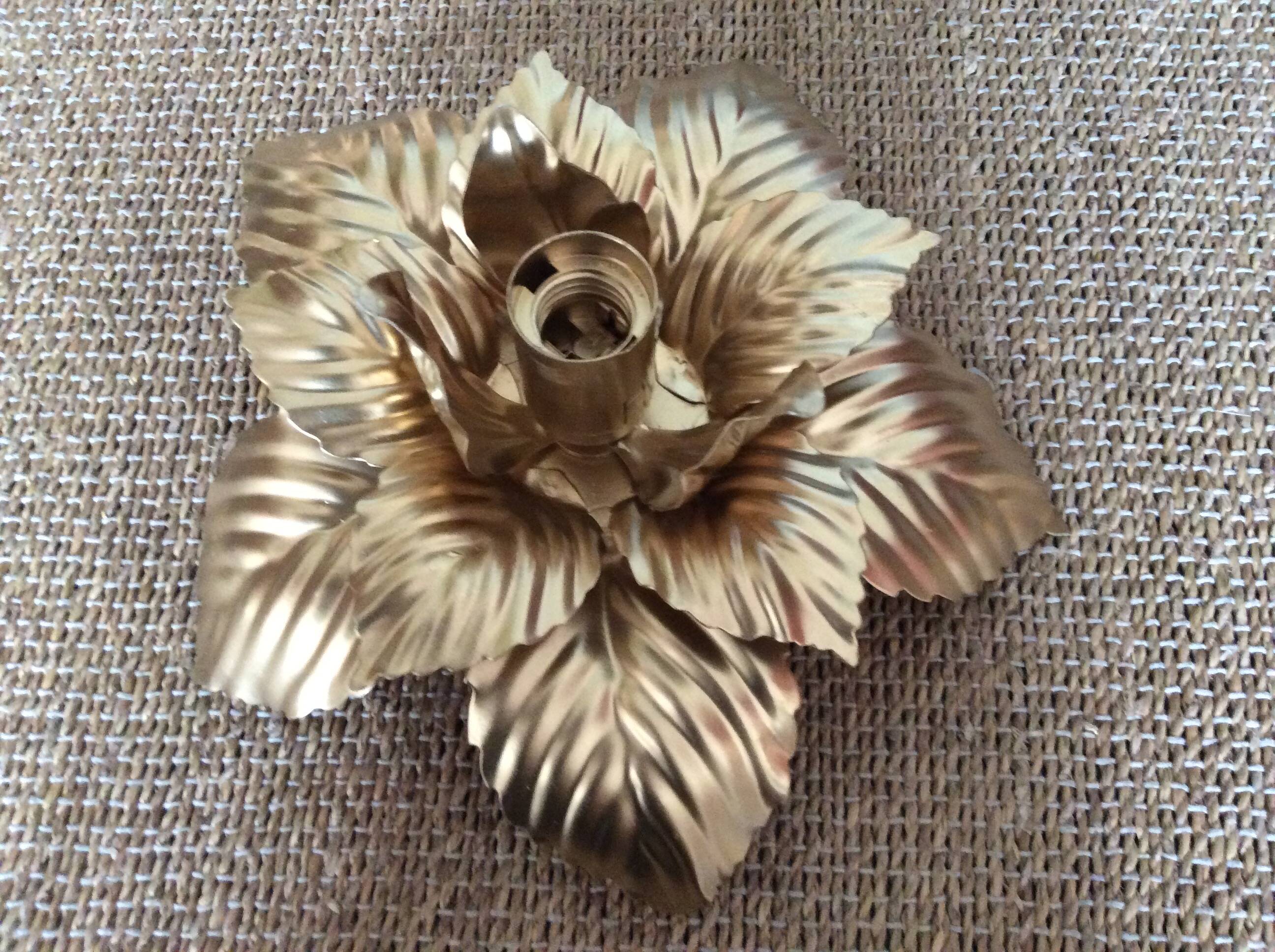 Gold metal flower wall light