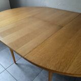Vintage round table from the 60s with butterfly extension