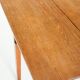 Vintage table with two folding leaves. Solid oak wood. France, 1940s