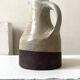 Large brutalist ceramic enamelled jug, signed "MH".