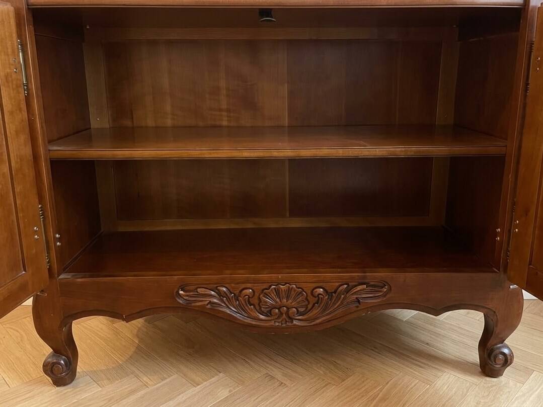 Antique cherry wood display cabinet in Louis XV style