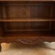 Antique cherry wood display cabinet in Louis XV style