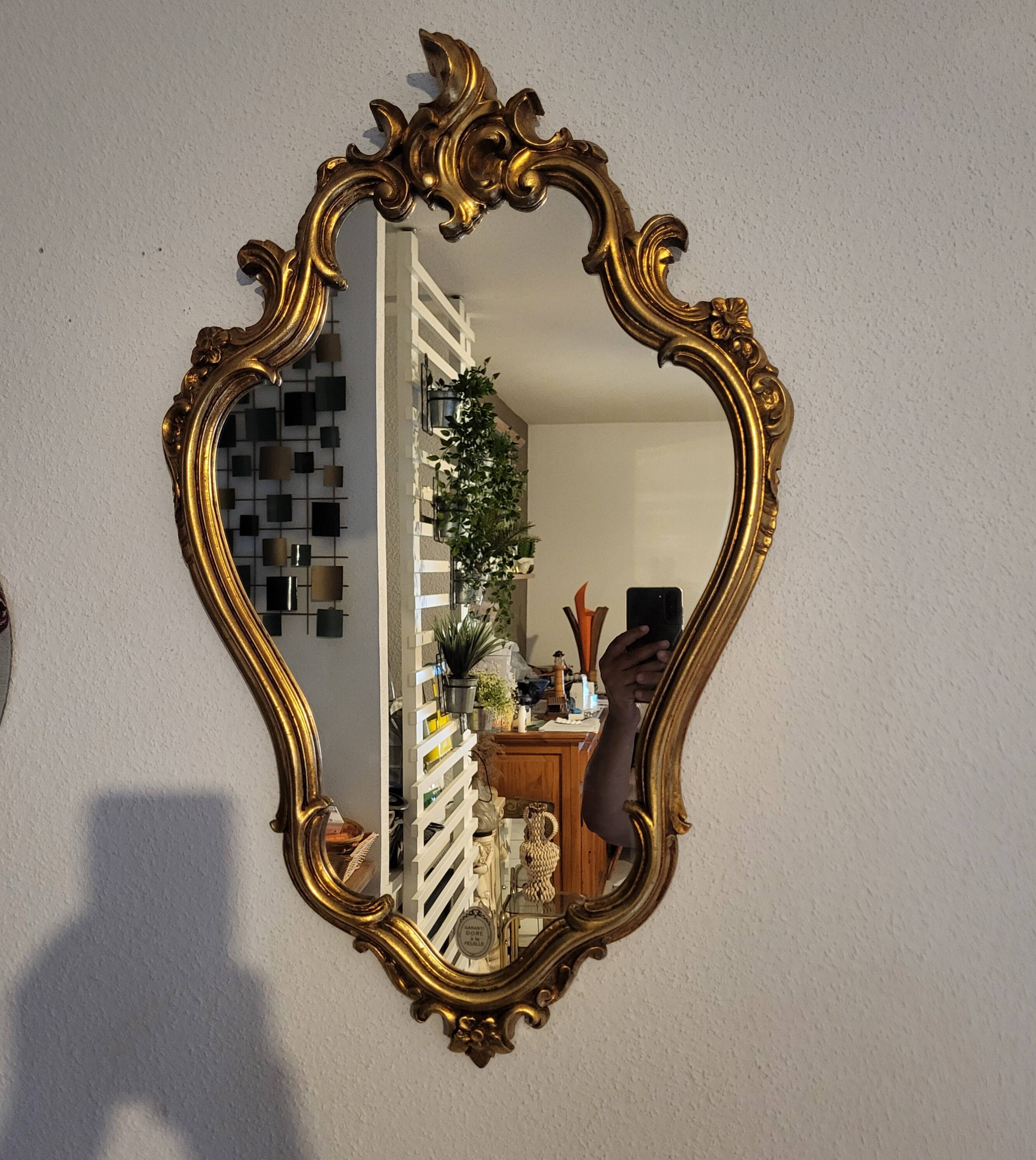 Miroir en bois d'or à  l or,style Louis 15