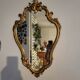 Miroir en bois d'or à  l or,style Louis 15