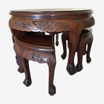 Carved coffee table and 4 built-in stools