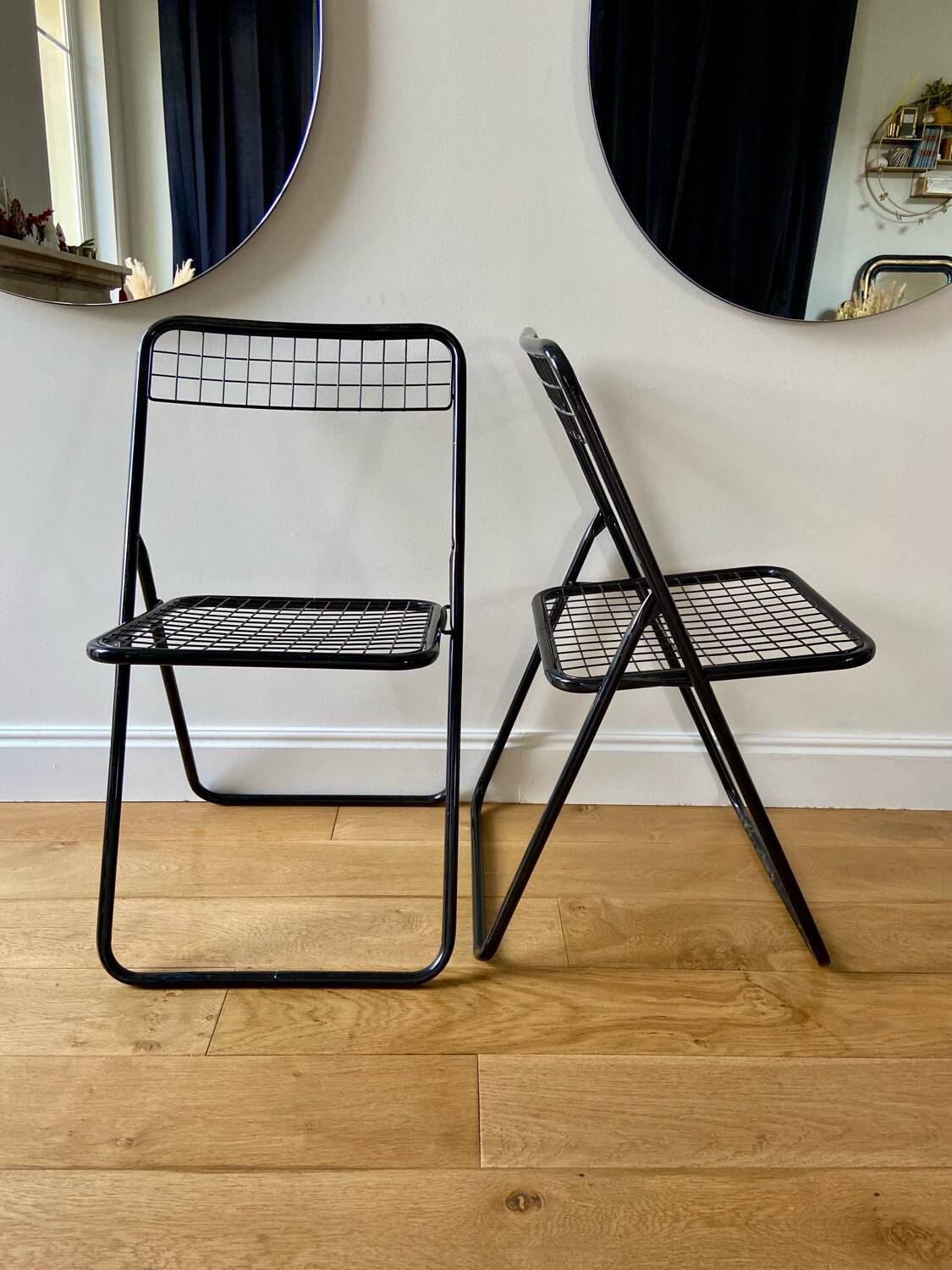 Pair of black lacquered metal "Ted Ned" chairs by Niels Gammelgaard, circa 1970-1980