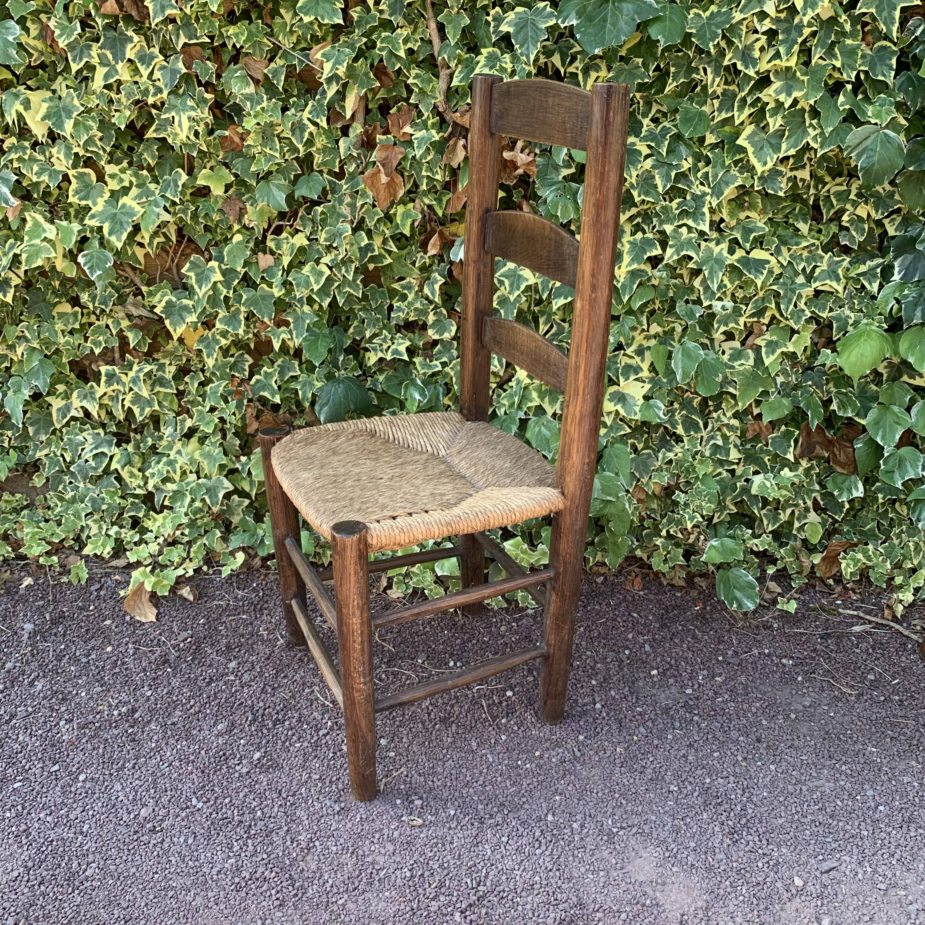 Set of 4 handcrafted rush chairs in solid oak.