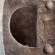 Large antique African bed in dark brown solid wood — sculptural, primitive, low, handcrafted