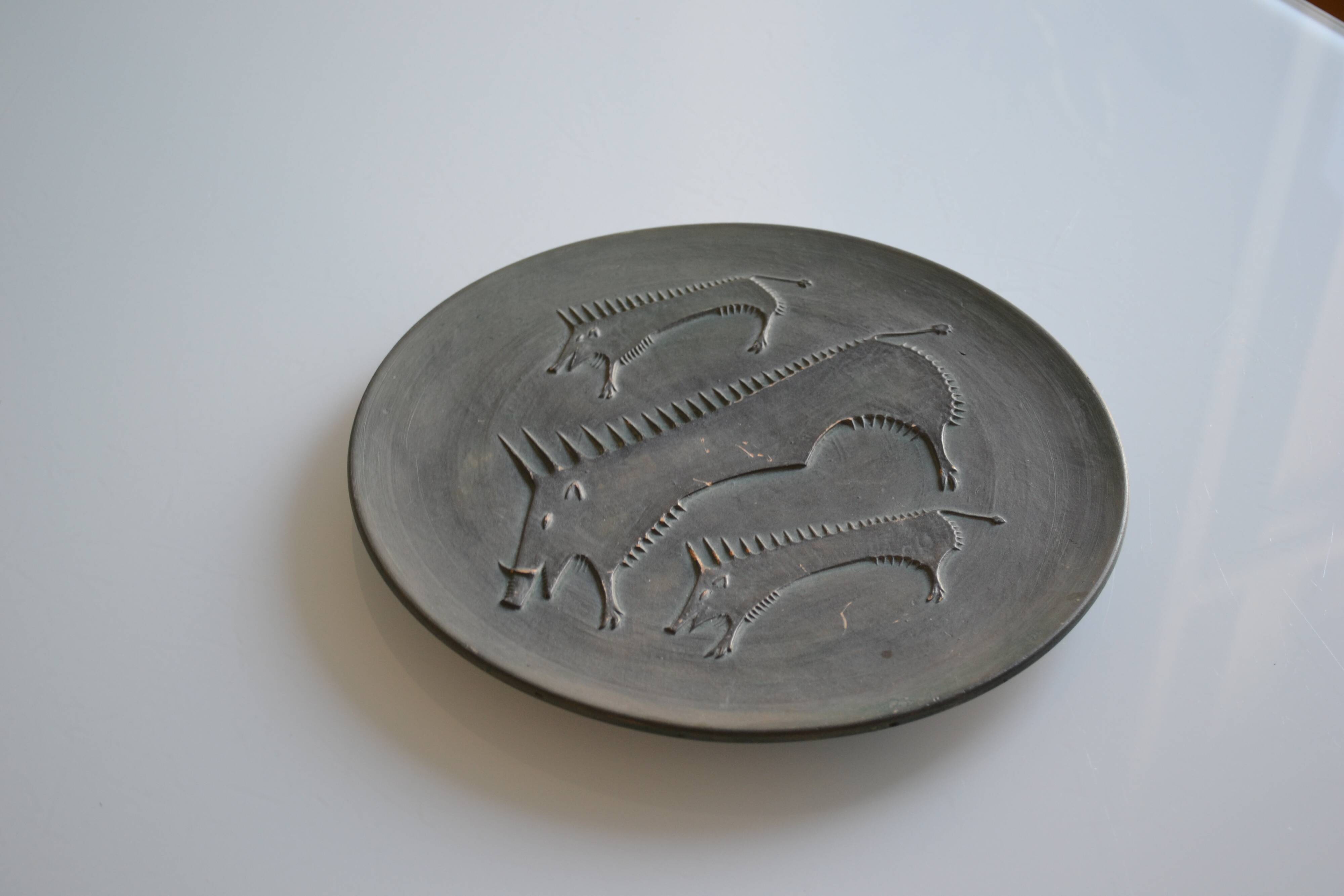 Ceramic wall plate attributed to Wim Mühlendyk