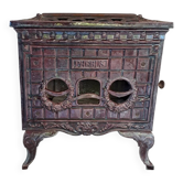 Antique enameled cast iron art deco wood stove, Phebus brand, aubergine color