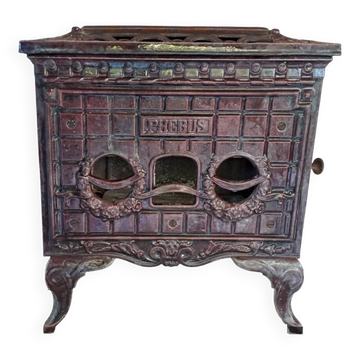 Antique enameled cast iron art deco wood stove, Phebus brand, aubergine color