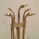 Fire necessary for the brass duck heads in the style of Maison Jansen.