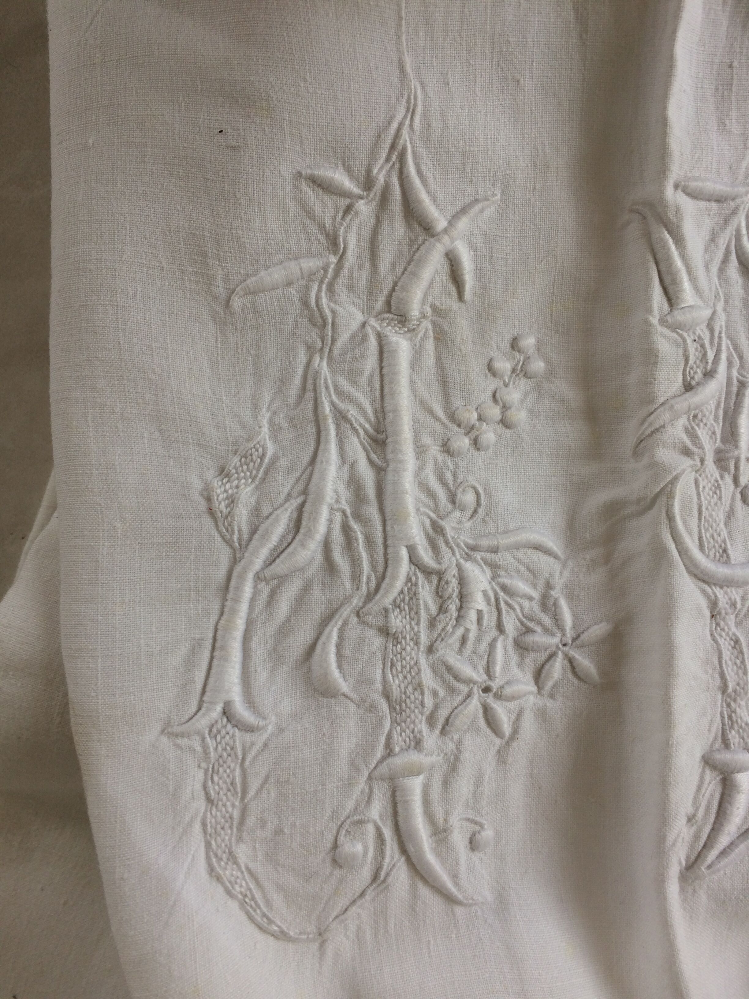 Antique linen sheet with days, embroideries and monograms worked
