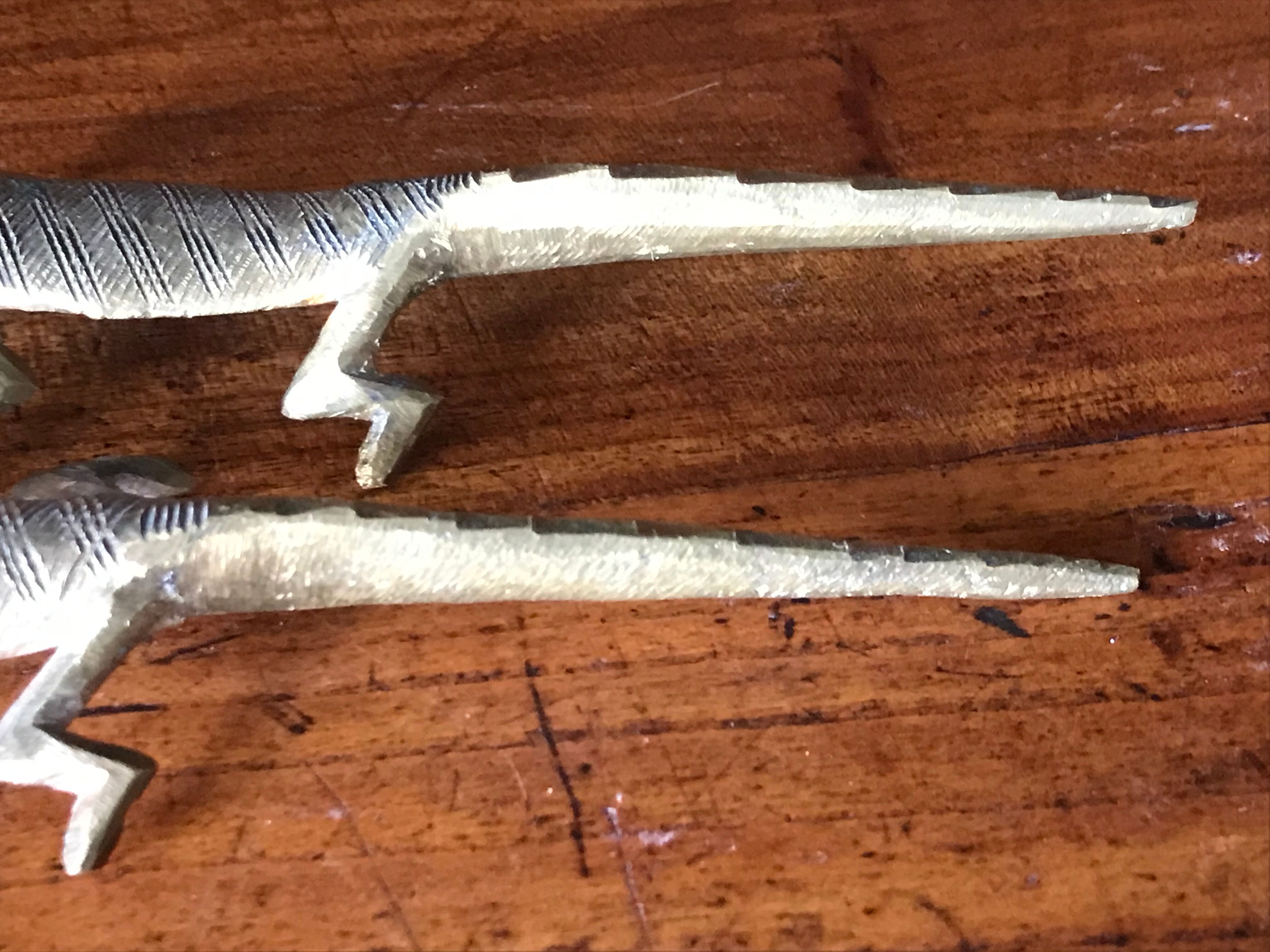 Couple of brass alligators