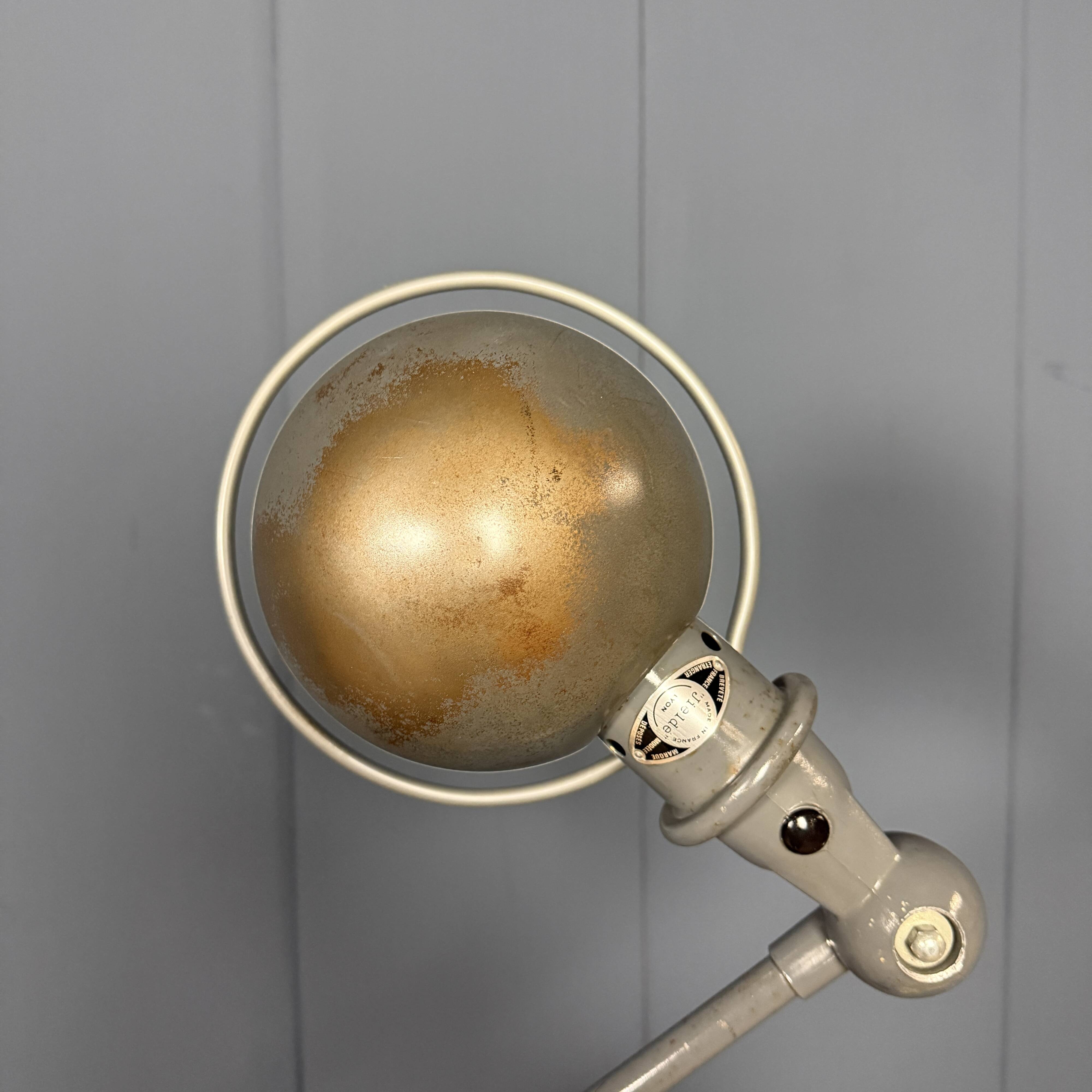 Dark grey Jielde three-arm clamp table lamp