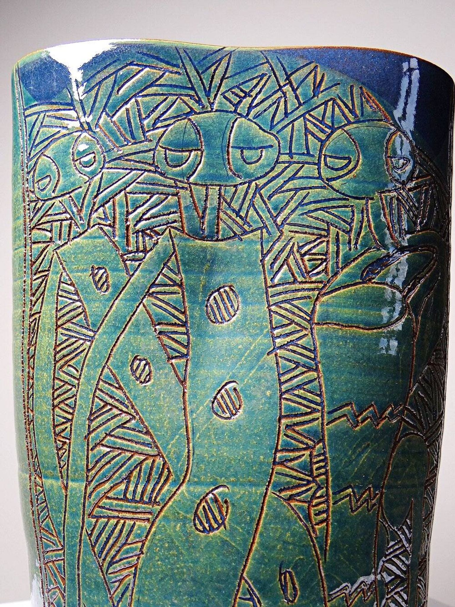 Vintage blue-green handcrafted pottery vase with incised tribal design by Eseka Pottery