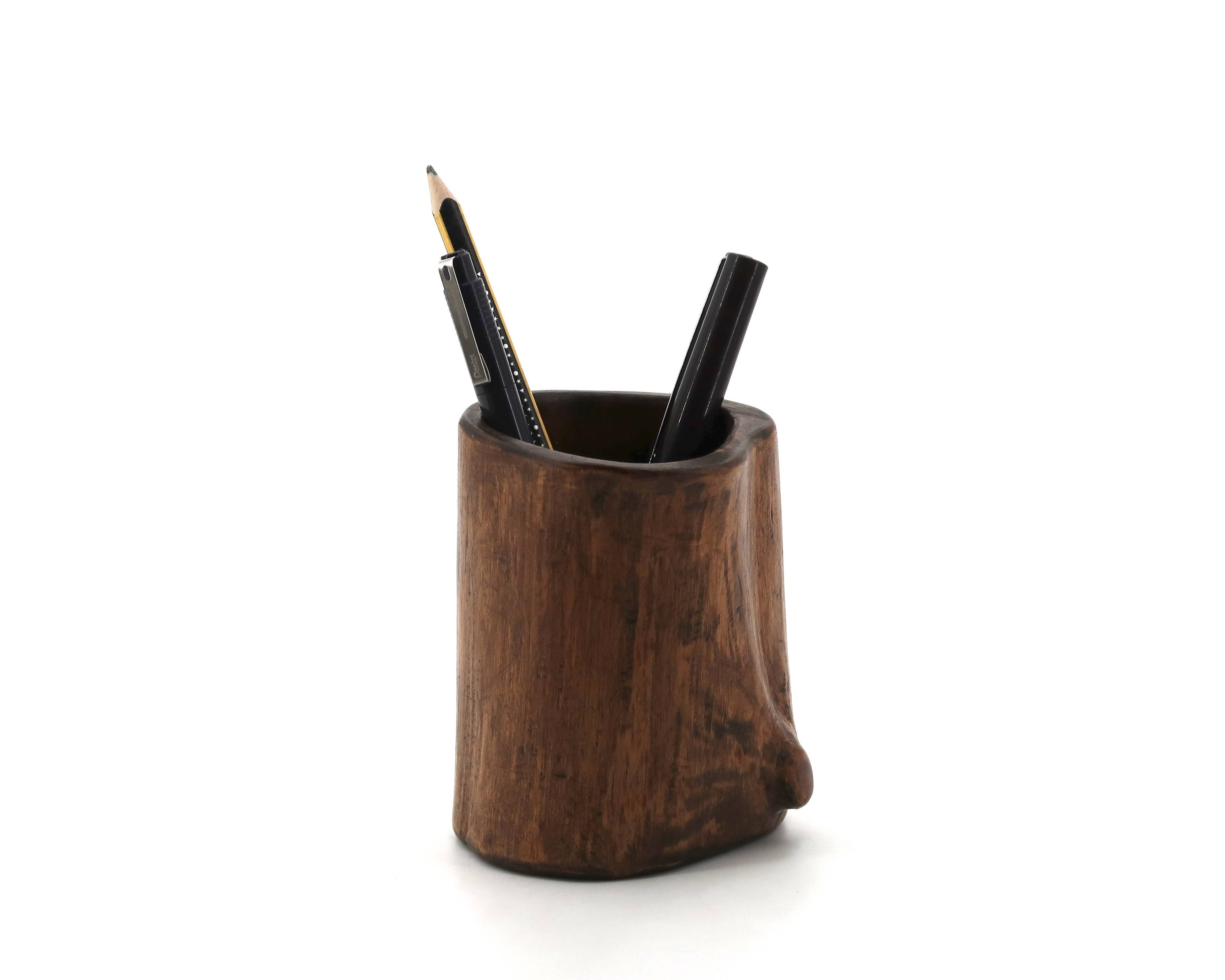 Small brutalist monoxyle vase in wood, 1970s.