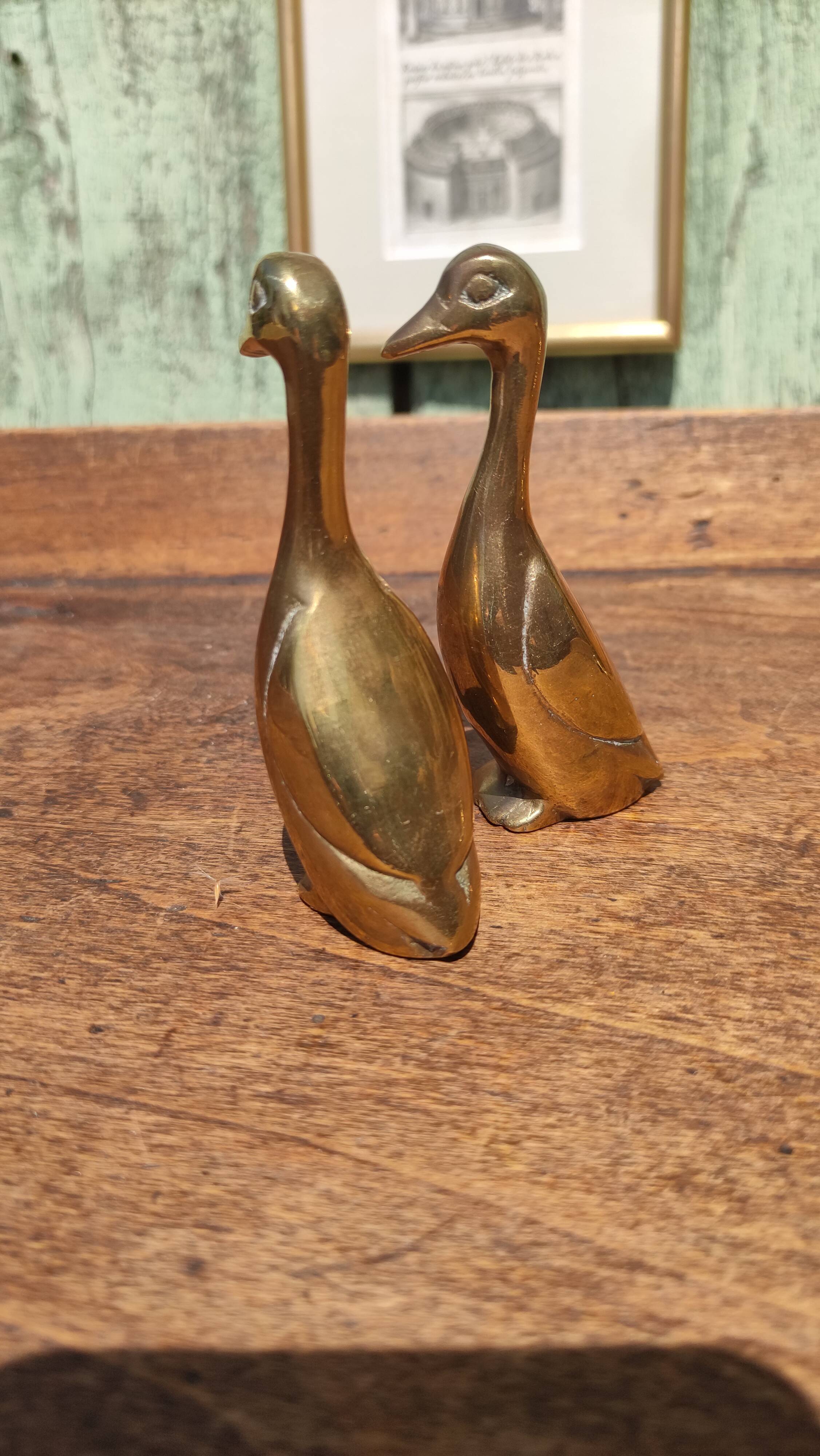 Pair of golden brass ducks