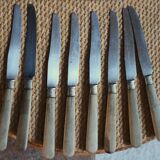 Lot of 8 antique knives with wooden handles.
