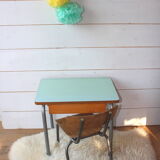Green formica desk of water