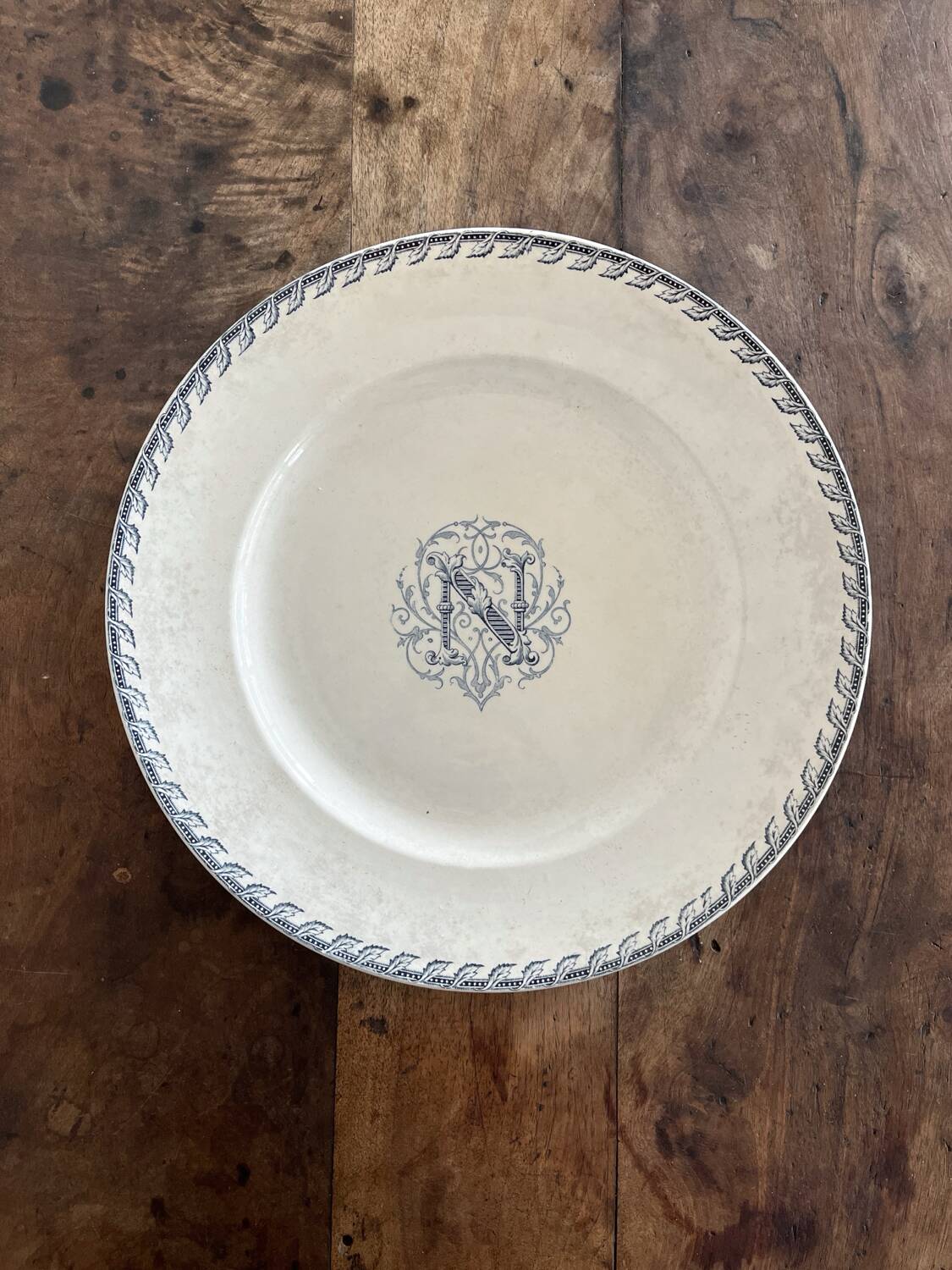 Round iron earth dish monogram “N” KG Lunéville