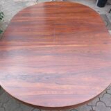 Round table with integrated extensions, rosewood. 1970