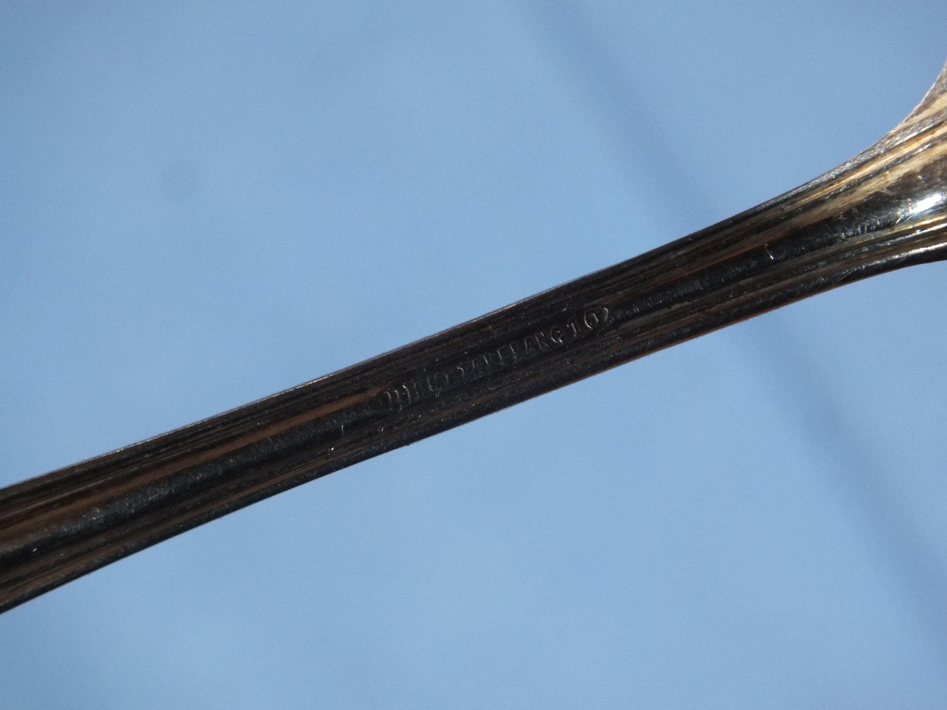 Old box of 12 small white metal spoons