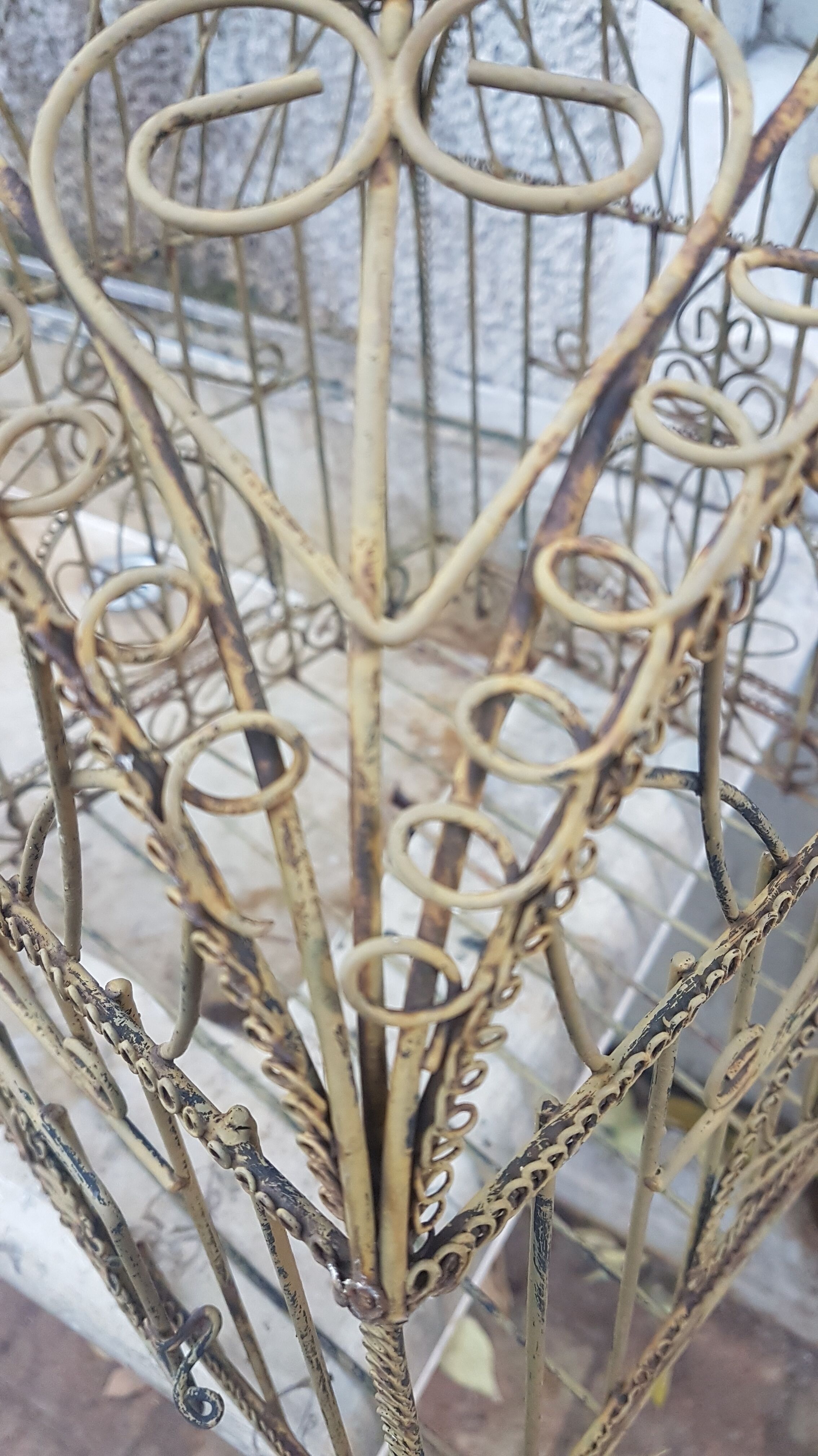 Painted old-bird cage in scrap
