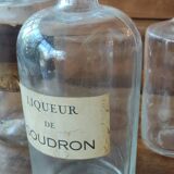 Series of 5 blown glass apothecary pharmacy bottles