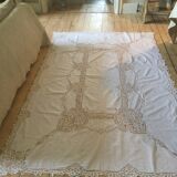 Embroidered white tablecloth and lace