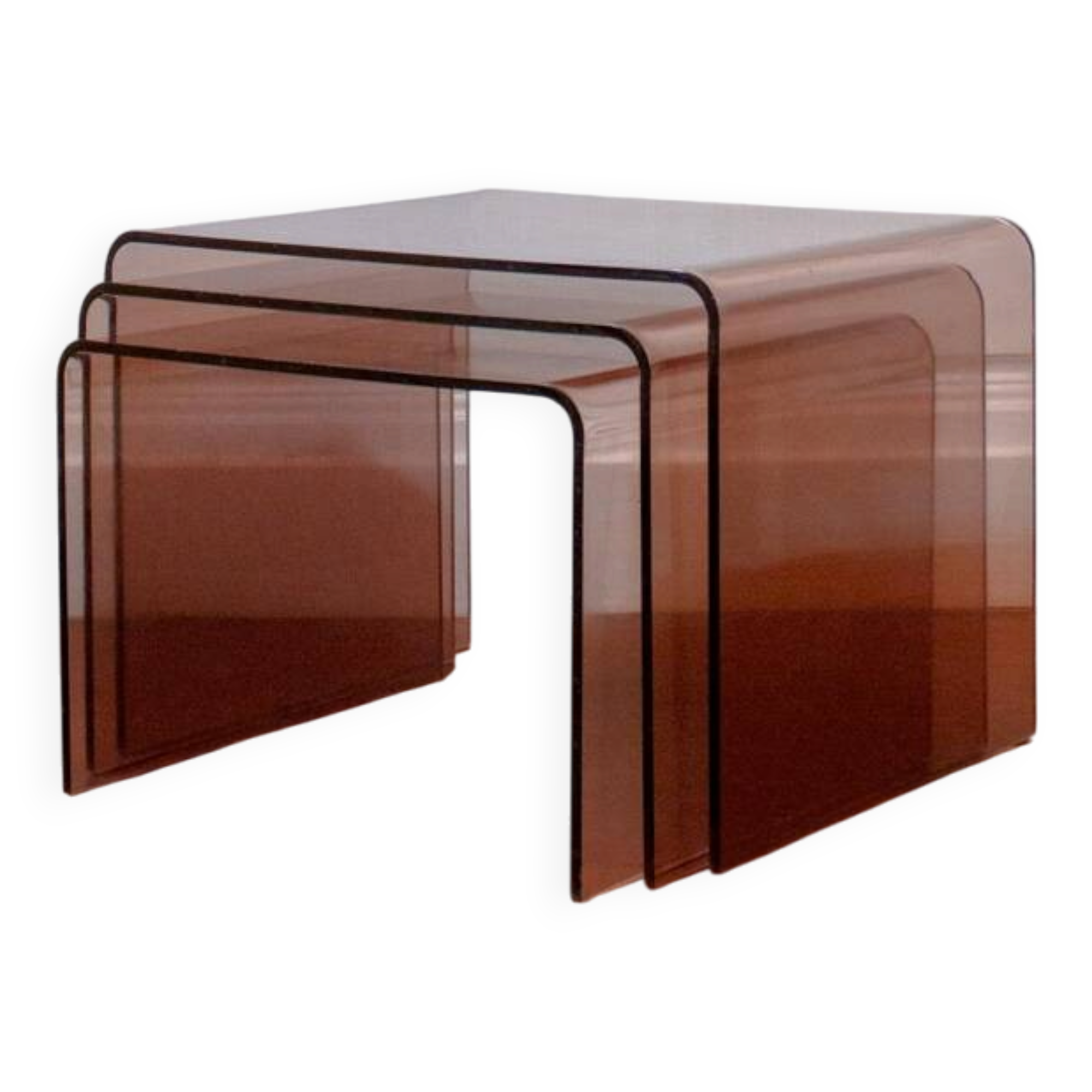 Vintage trio of nesting tables in smoked plexiglass by Michel Dumas, year.