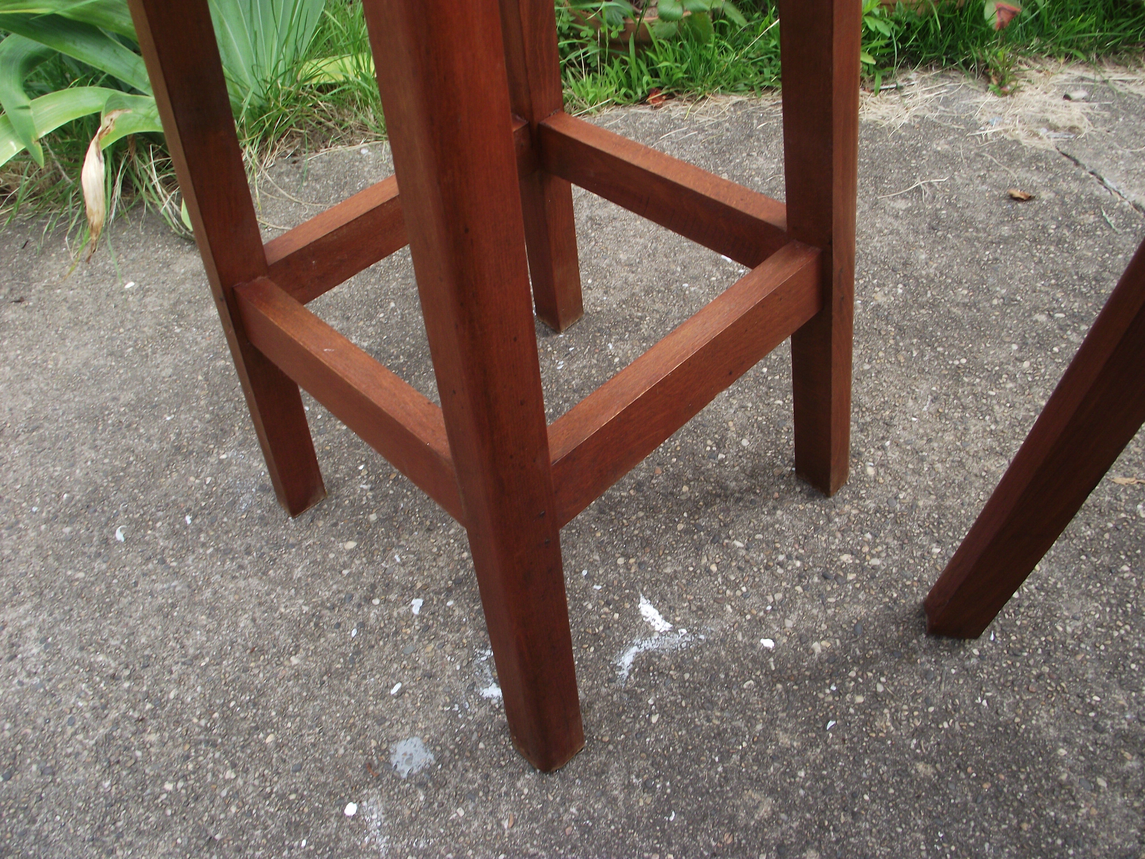 Two wooden artist stools in the early 20th century