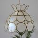 Suspension en nacre et laiton forme fleur