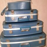 Vintage nesting suitcases called "flight attendant"
