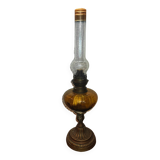 Antique kerosene lamp with yellow glass