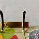 Vintage wall-mounted coat rack in golden aluminum - triple coat hook