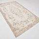 Rare tapis vintage fait main tons rose poudré et beige, motifs floraux