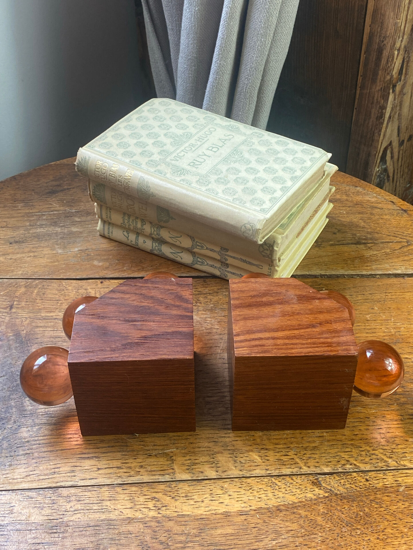Wooden bookends and spherical glass balls