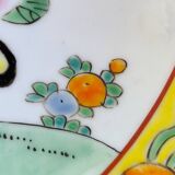 Yellow porcelain plate with saturated and vivid colors. Handmade in Japan