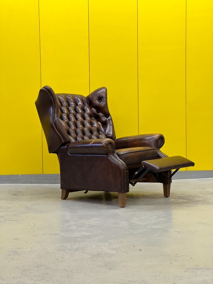 Brown vintage handmade chesterfield recliner armchair
