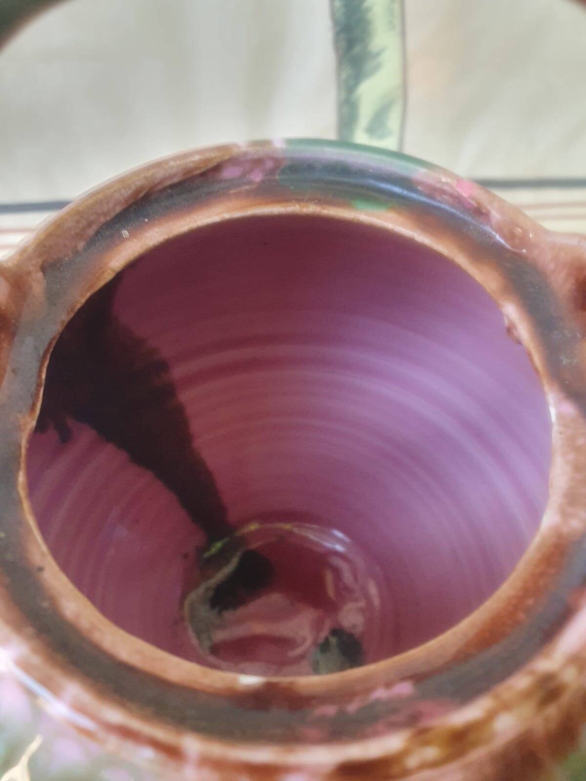Jug pitcher Provençal earthenware glazed with pink and green glaze.