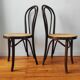 4 antique curved wood and cane chairs