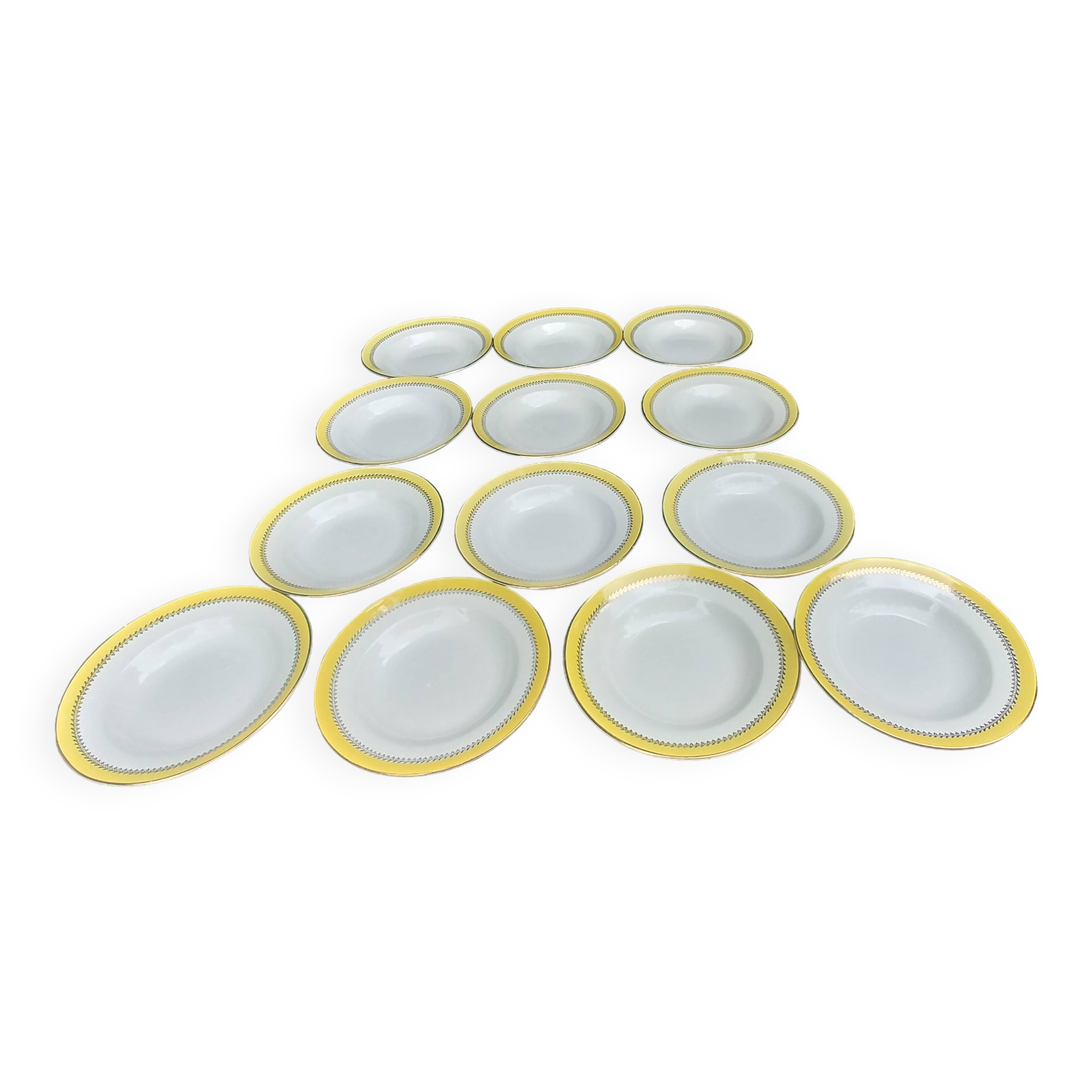 Set of thirteen old porcelain soup plates signed "Biarritz"